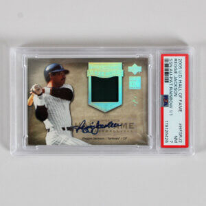 2005 U.D. Hall of Fame Reggie Jackson Graded Card #HFSRJ2 SSN. AUTO-Pat Rainbow 1/1 - PSA 7